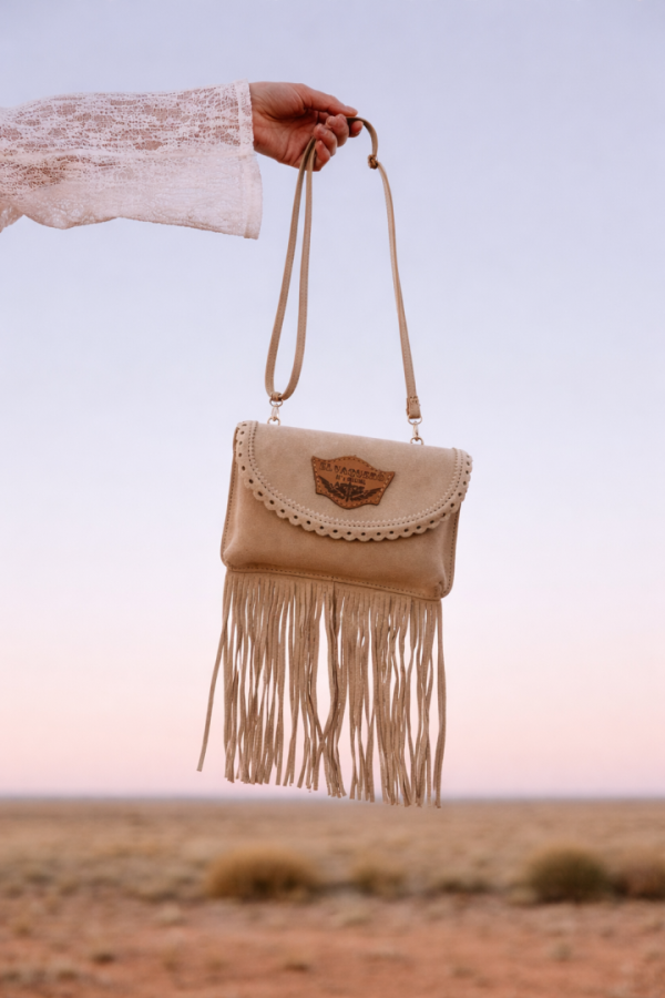 BORSETTA IN PELLE CON FRANGE LARA SILVERSTONE CORDA